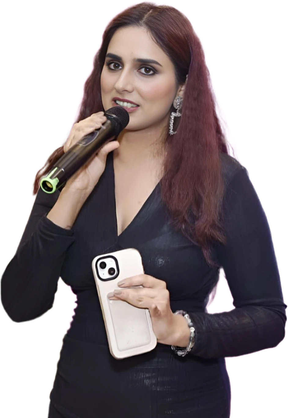 Nikita hosting an event with a microphone